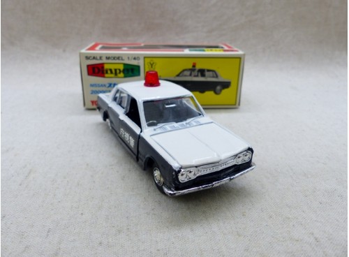 Yonezawa Diapet 230 Nissan 2000GT-R Voiture de police NM/B